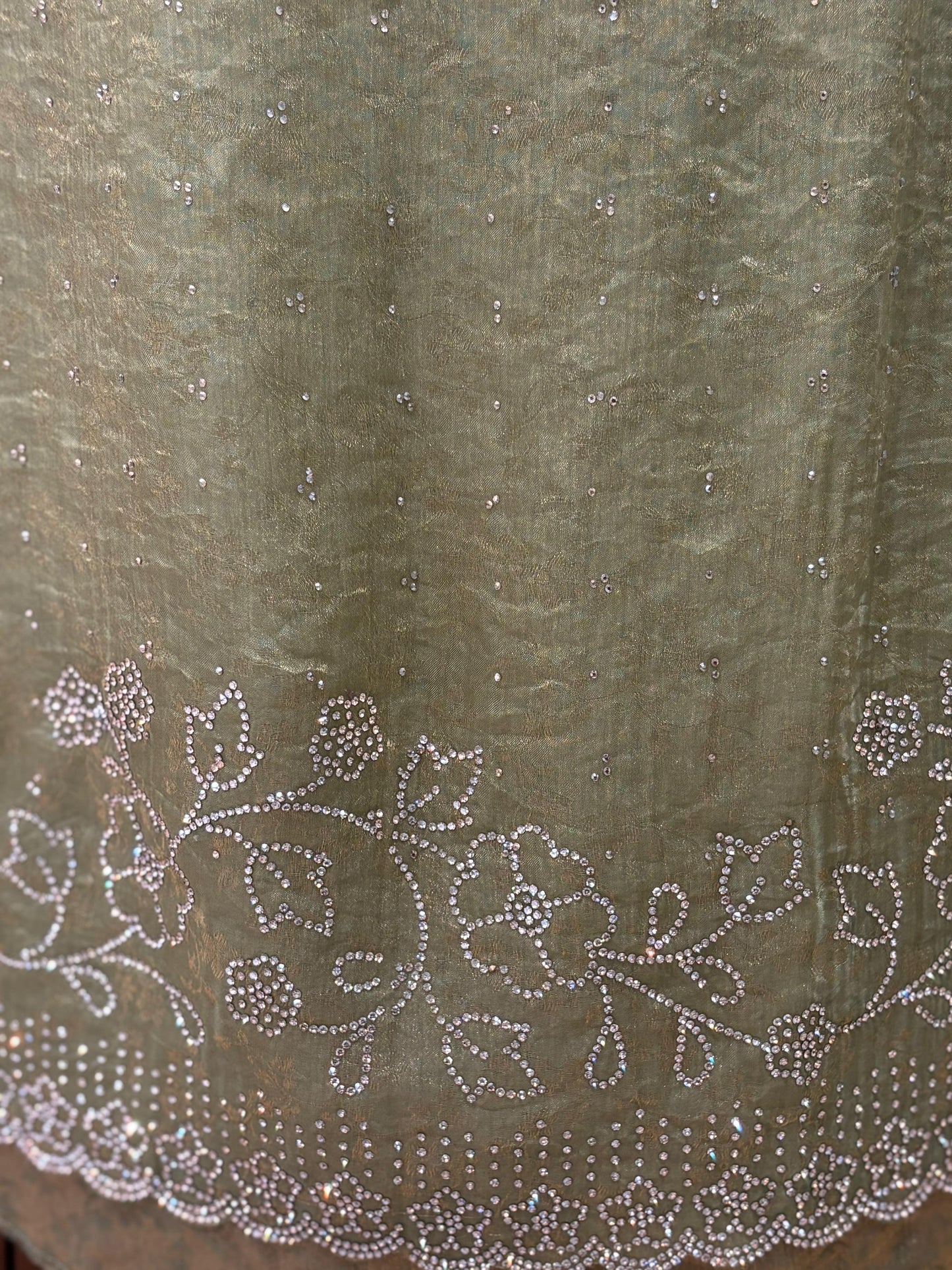 Unveil festive elegance with this stunning unstitched suit