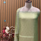 Unveil festive elegance with this stunning unstitched suit