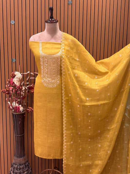 Step into festive finesse with this unstitched suit set
