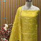 Step into festive finesse with this unstitched suit set
