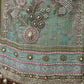 Step into elegance with this exquisite unstitched suit set