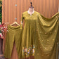 A soft and breathable cotton fabric in a rich olive green shade