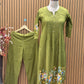 A soft and breathable cotton fabric in a rich olive green shade
