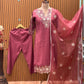 Feel the charm of tradition in this mauve-pink muslin cotton suit set