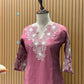 Feel the charm of tradition in this mauve-pink muslin cotton suit set