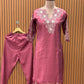 Feel the charm of tradition in this mauve-pink muslin cotton suit set