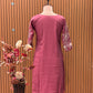 Feel the charm of tradition in this mauve-pink muslin cotton suit set