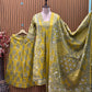 Vibrant yellow Anarkali set in pure cotton features intricate ethnic prints