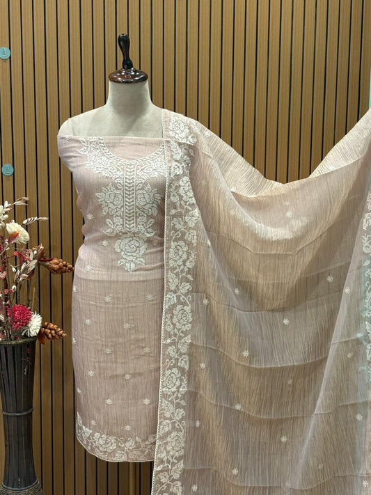 Experience elegance with our exquisite unstitched suit set