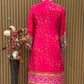 Radiate festive charm in this vibrant pink crape suit set