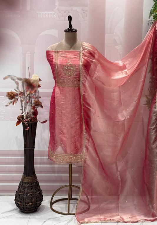 Step into elegance with this luxurious unstitched suit set