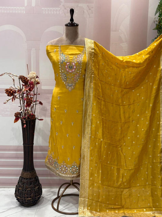 Experience sheer elegance with this exquisite unstitched suit set