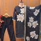 Elegance meets comfort in this black muslin kurti set