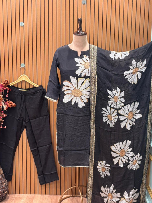 Elegance meets comfort in this black muslin kurti set