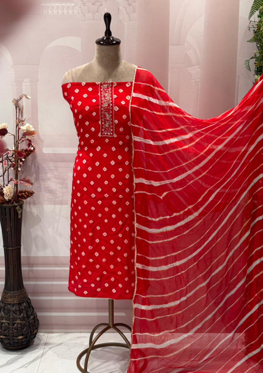 Unstitched elegance meets tradition in this stunning Bandhej print suit set