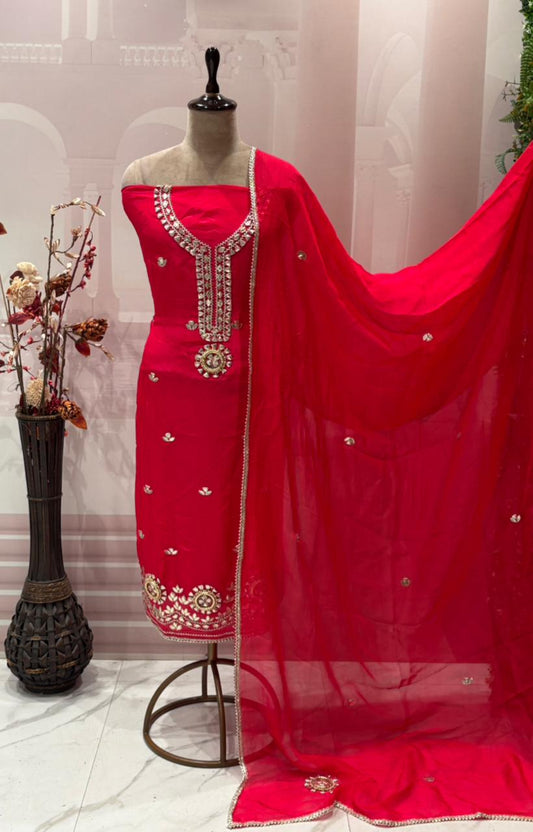 Elevate your festive style with our luxurious unstitched suit
