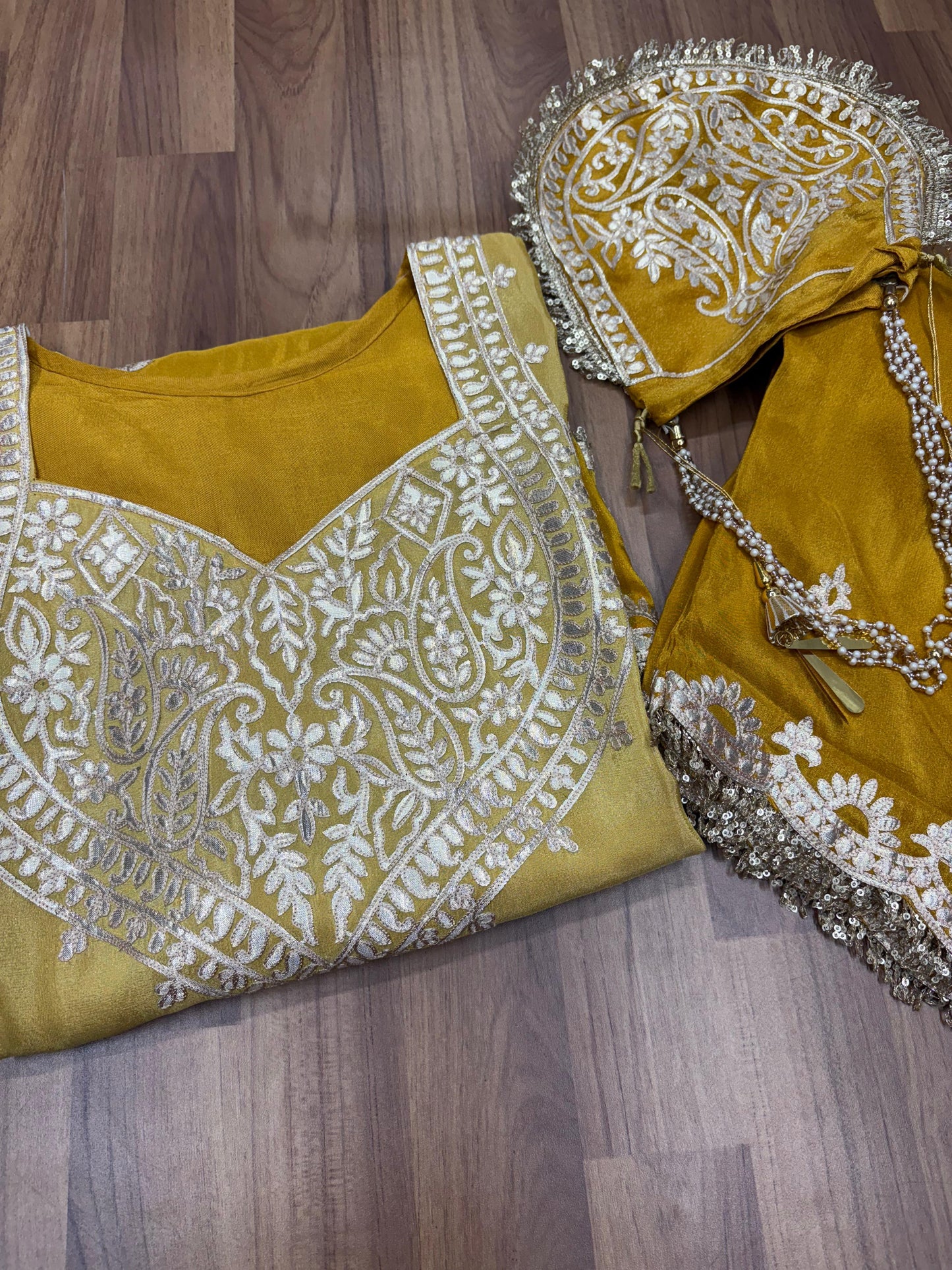 Elevate your festive charm with our luxurious tissue shimmer fabric cord set