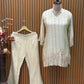 Elegant short kurti in premium tissue shimmer with intricate handwork