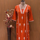 Graceful A-line cotton kurti set in vibrant orange