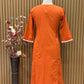 Graceful A-line cotton kurti set in vibrant orange