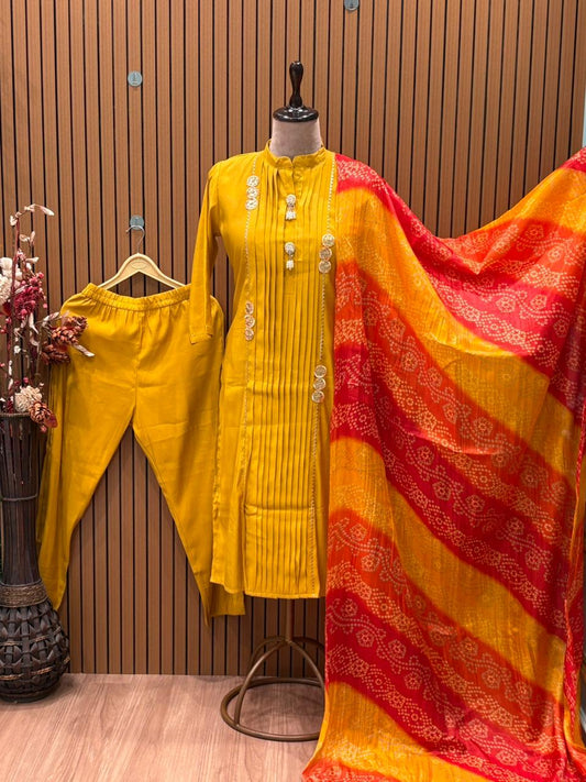 Brighten your festive look with this mustard muslin kurti set