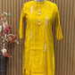 Brighten your festive look with this mustard muslin kurti set