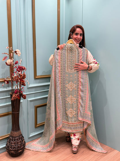 Elegance with our unstitched suit collection crafted in rich crush tissue shimmer