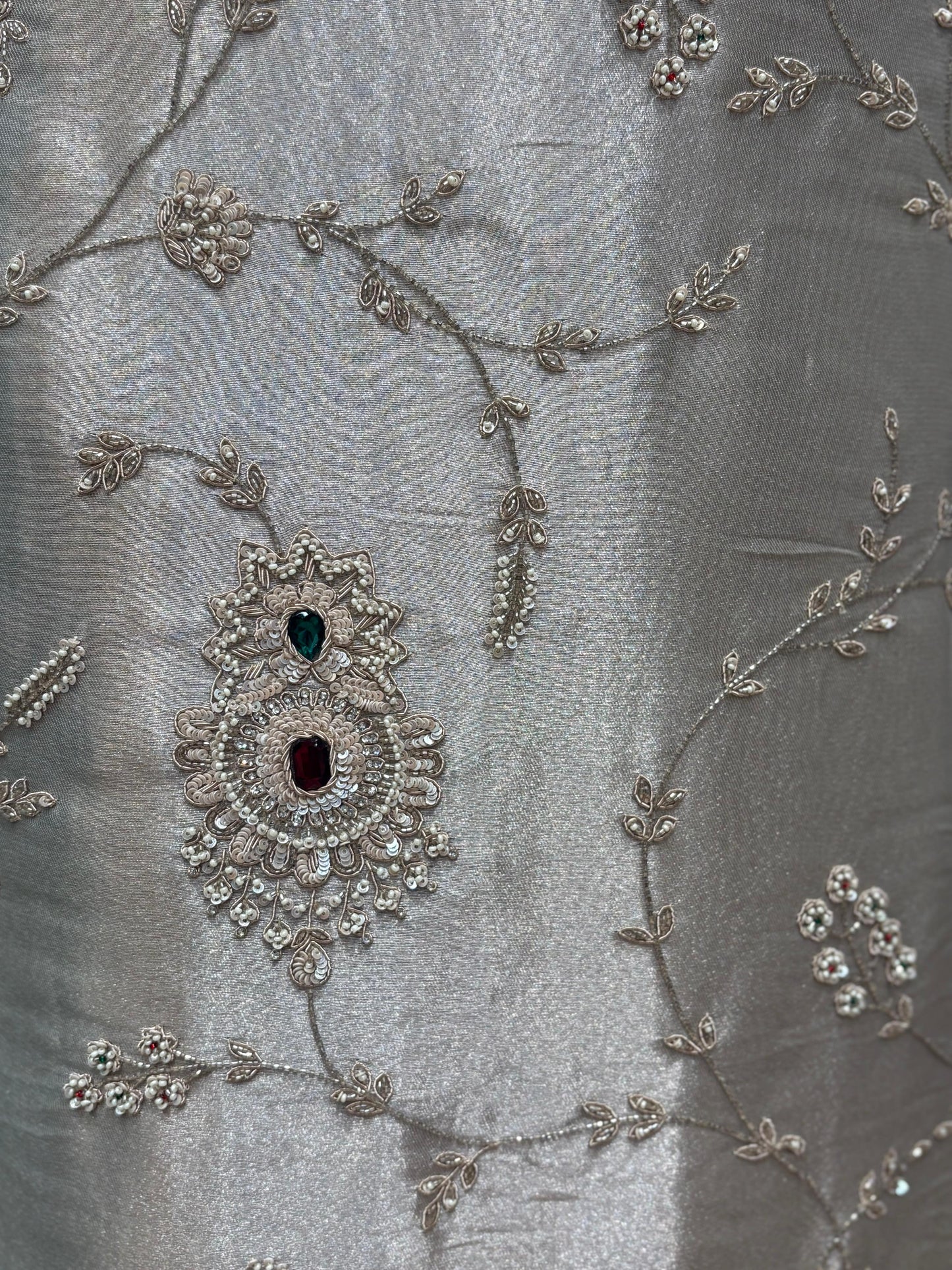 Step into timeless elegance with our luxurious pure tissue unstitched suit,