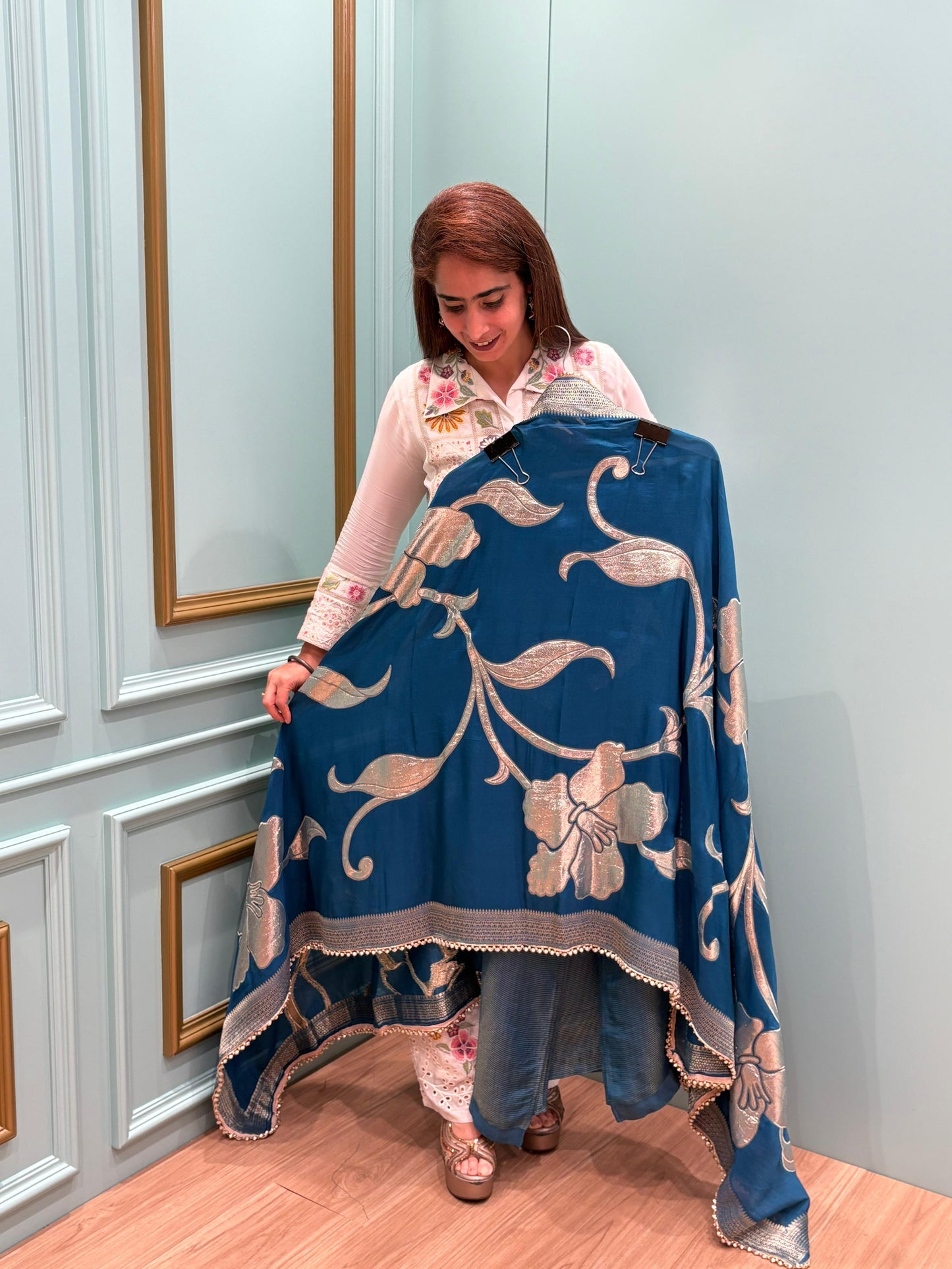 Unveil the beauty of tradition with a modern glow in our Organza Shimmer