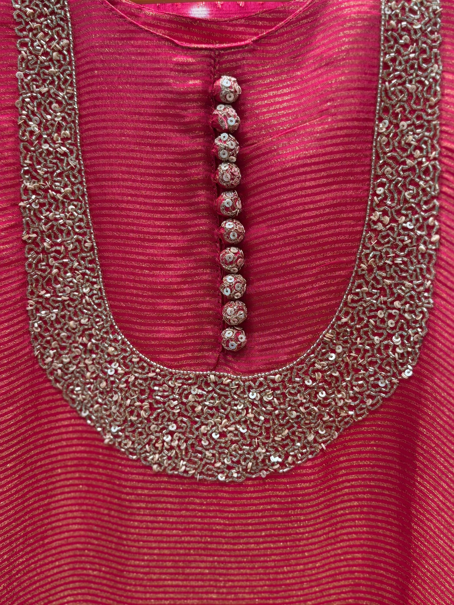 Unveil the beauty of tradition with a modern glow in our Organza Shimmer