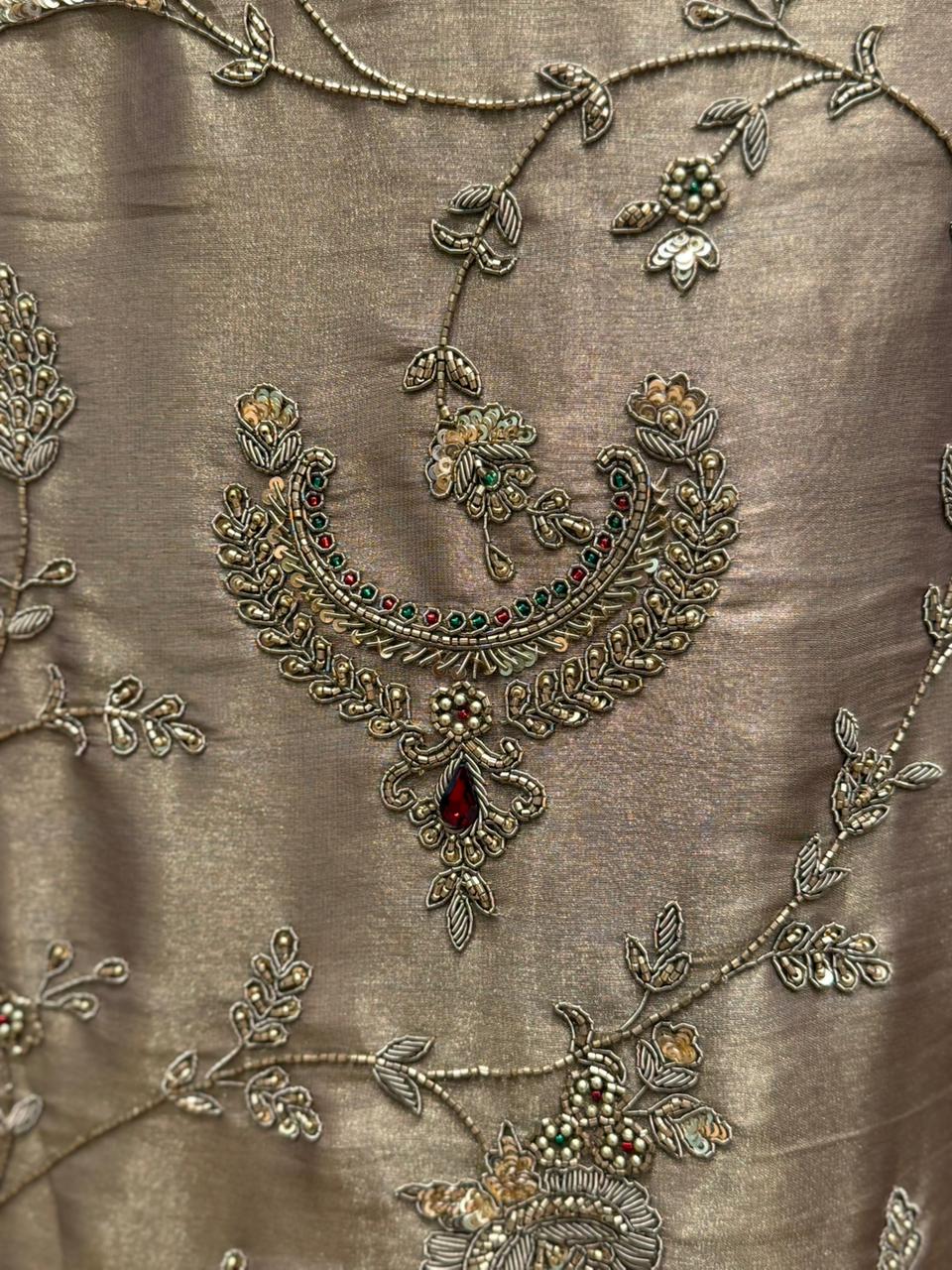 Elevate your ethnic wardrobe with our unstitched organza shimmer suit set