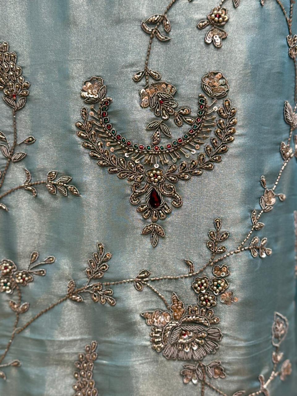 Elevate your ethnic wardrobe with our unstitched organza shimmer suit set