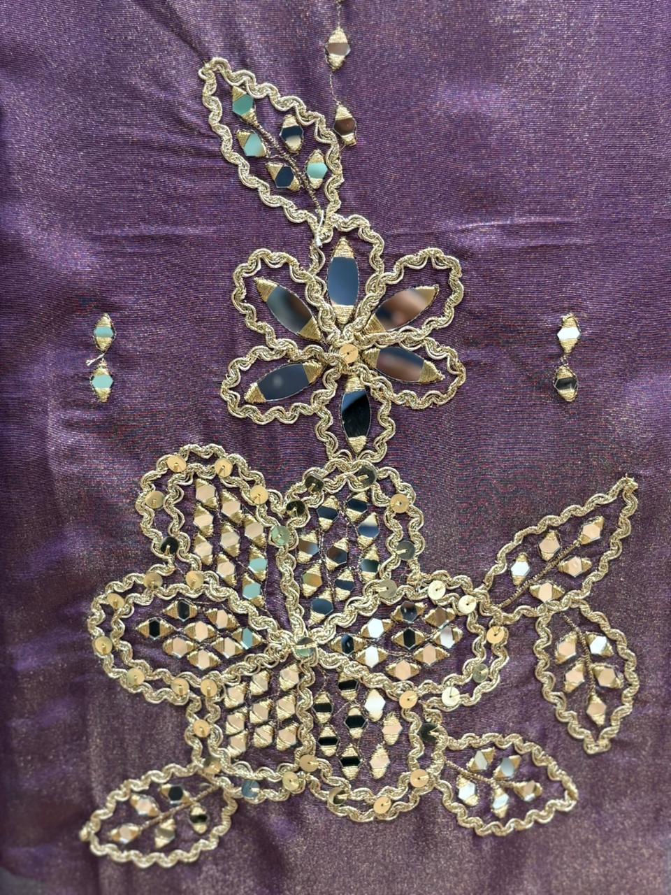 Organza Shimmer Unstitched Suit featuring all-over mirror work