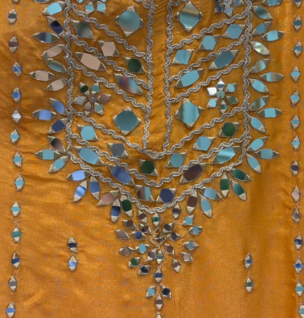 Organza Shimmer Unstitched Suit featuring all-over mirror work