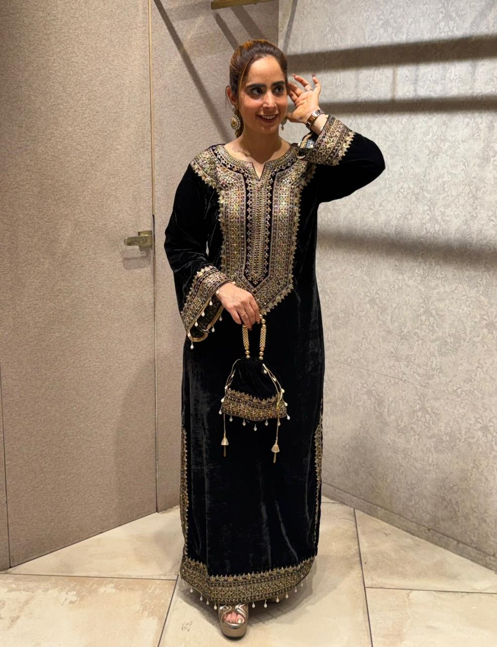 Redefine luxury with our Velvet Pheran, crafted