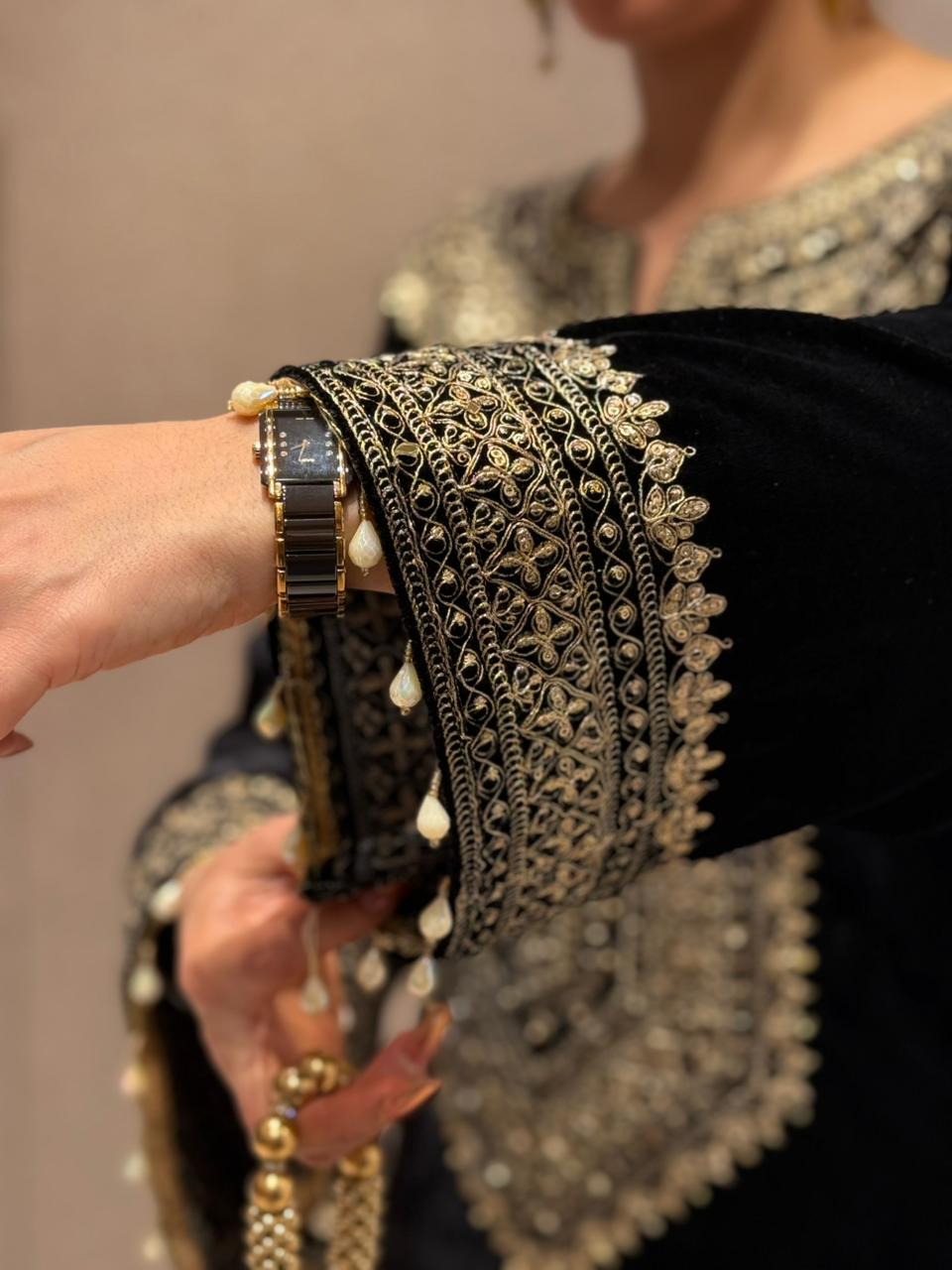 Redefine luxury with our Velvet Pheran, crafted