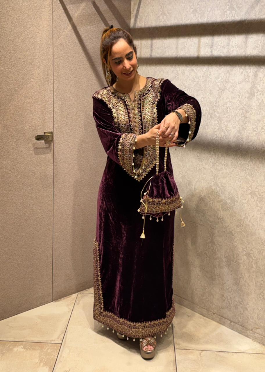 Redefine luxury with our Velvet Pheran, crafted