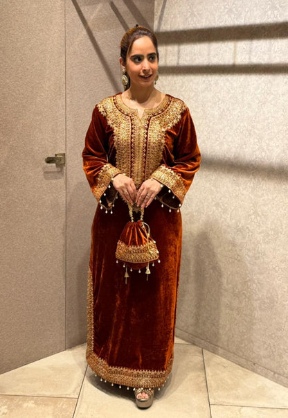 Redefine luxury with our Velvet Pheran, crafted