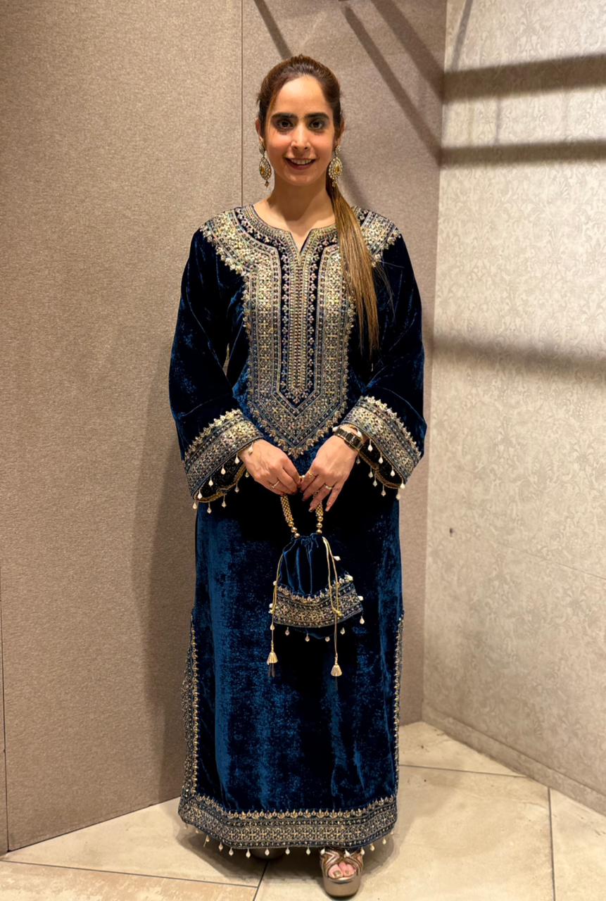 Redefine luxury with our Velvet Pheran, crafted