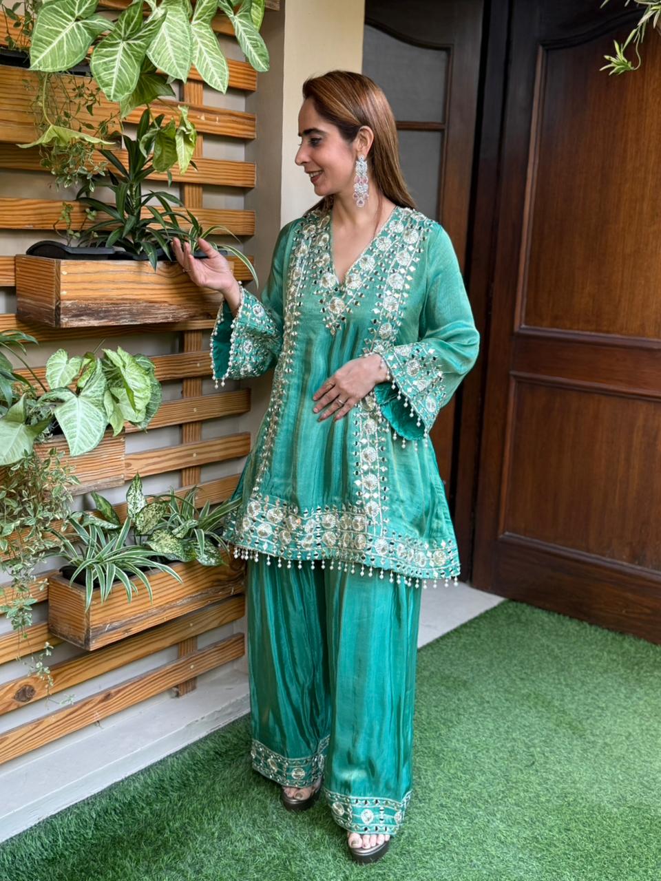 Crafted in luxurious shimmer organza