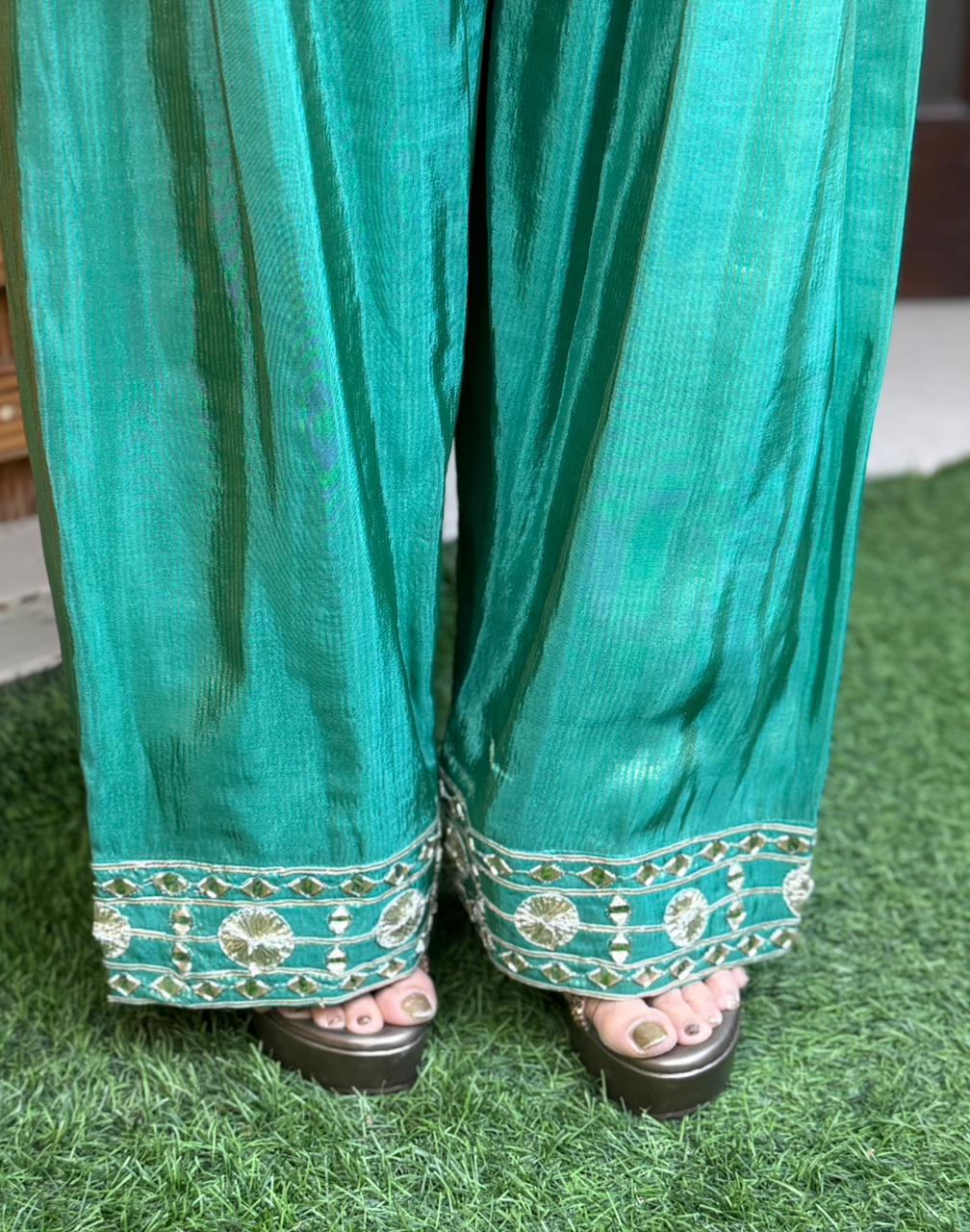 Crafted in luxurious shimmer organza