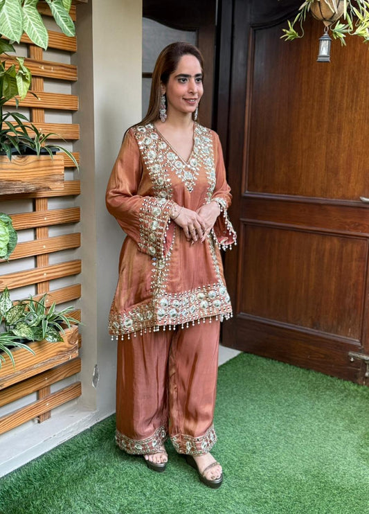 Crafted in luxurious shimmer organza