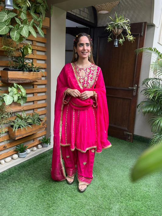 Exquisite short Anarkali set is beautifully crafted in luxurious Upada silk