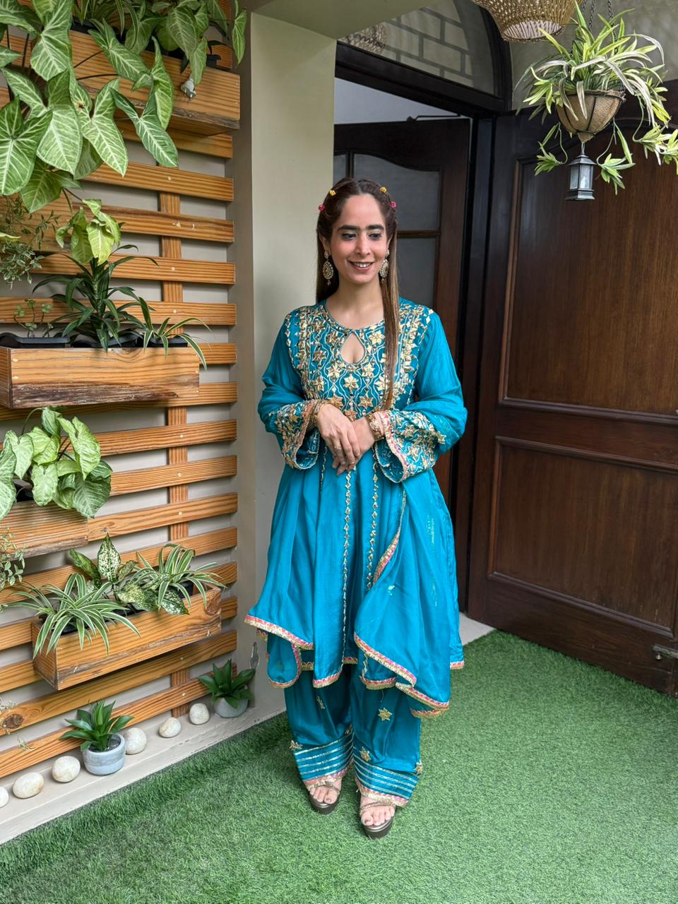 Exquisite short Anarkali set is beautifully crafted in luxurious Upada silk