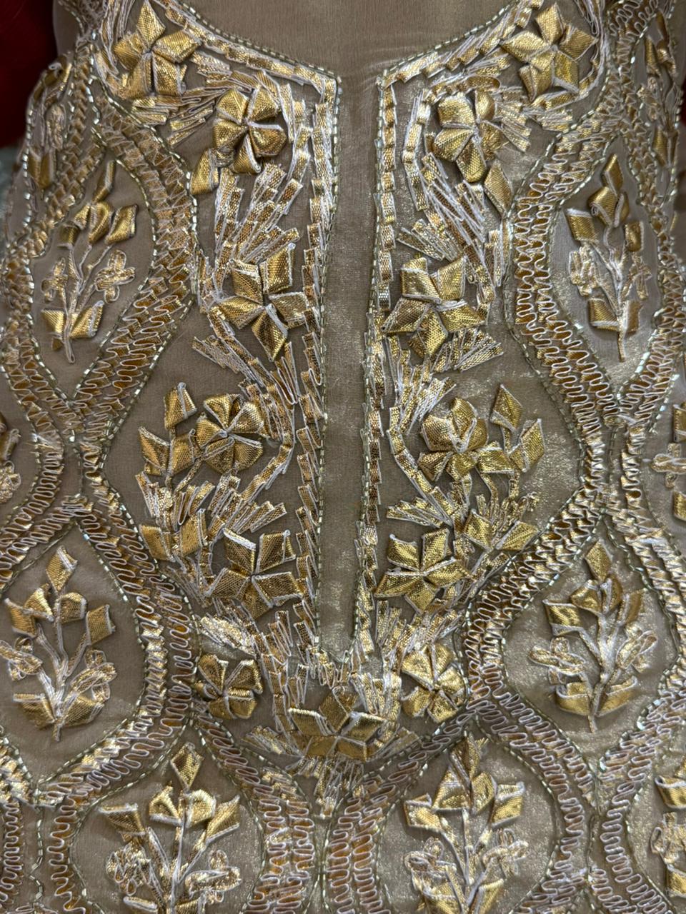 Elegant unstitched fabric suit set is crafted for those who love timeless luxury