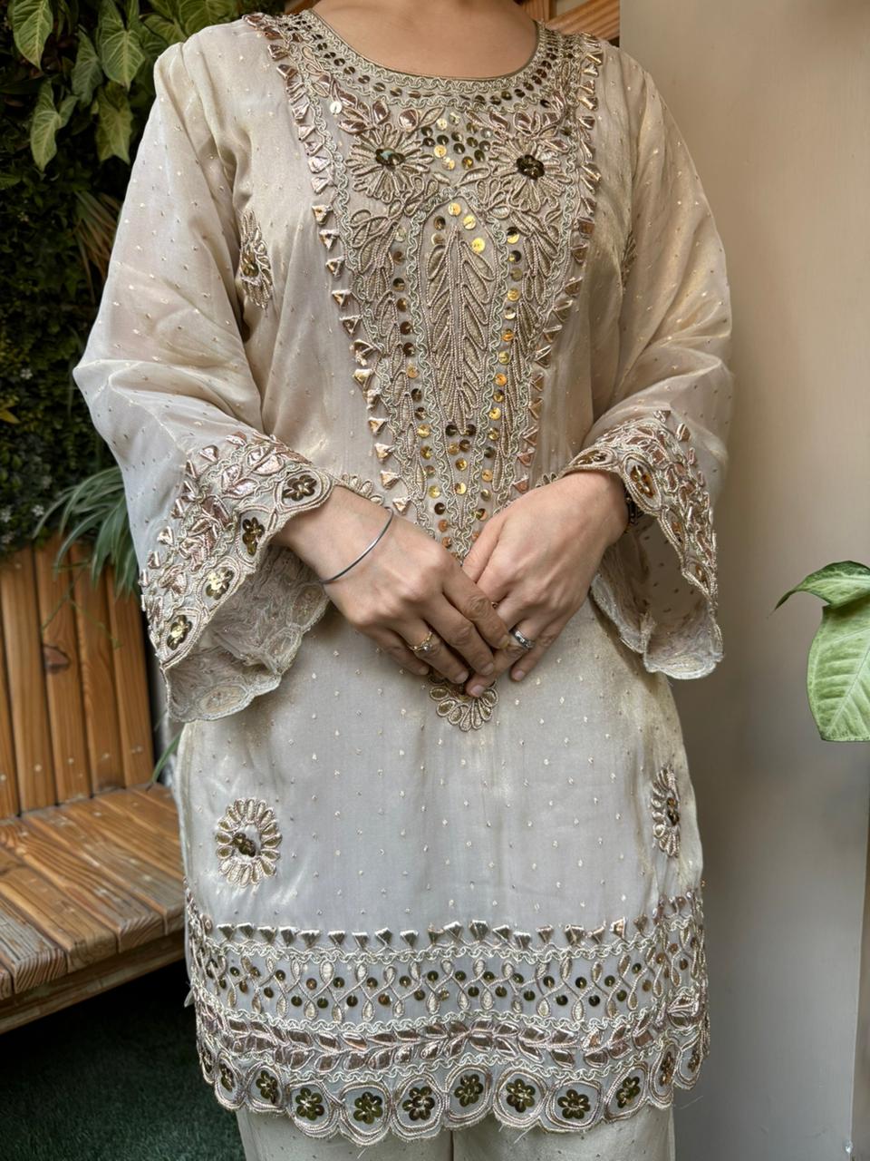 Crafted in luxurious shimmer organza fabric