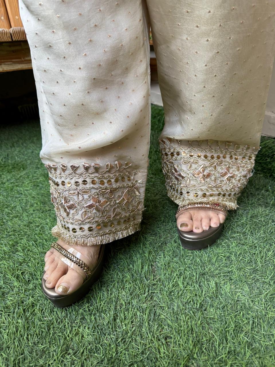 Crafted in luxurious shimmer organza fabric