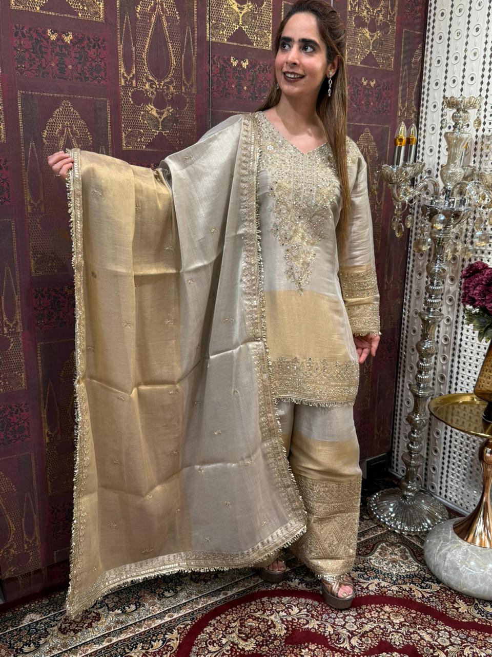 Presenting a timeless three-piece ensemble that defines grace