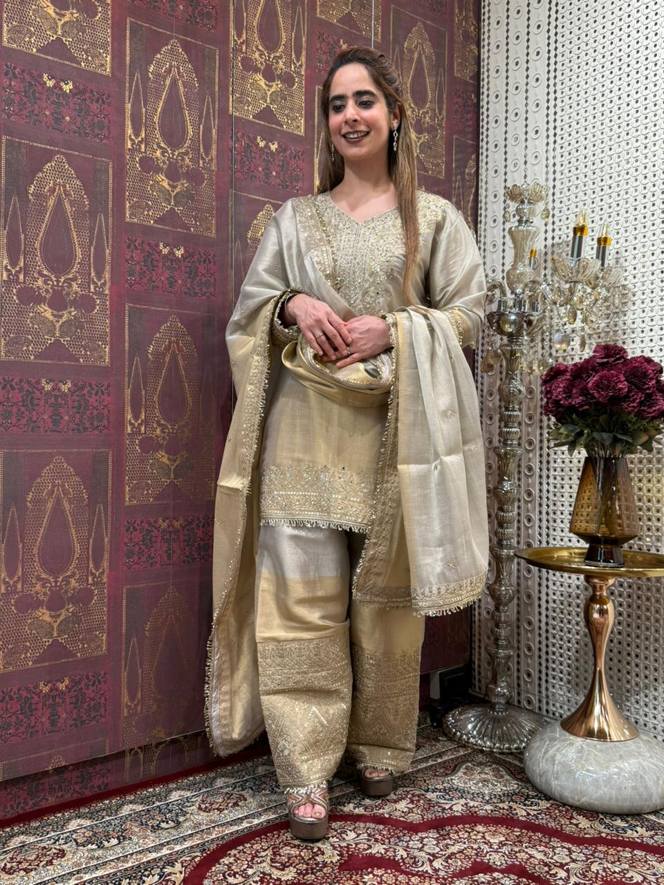 Presenting a timeless three-piece ensemble that defines grace