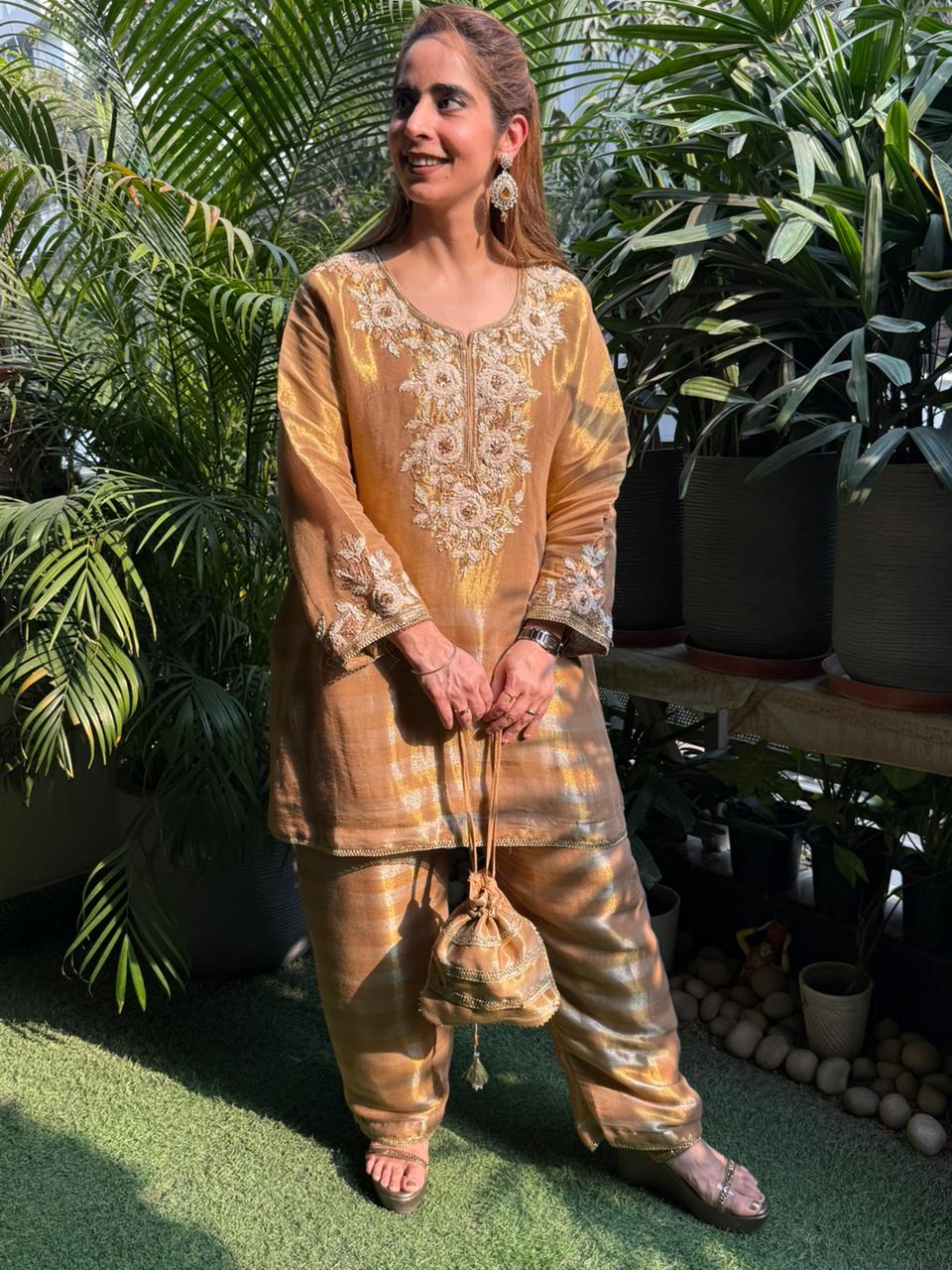 Elegant cord set crafted in luxurious tissue silk fabric